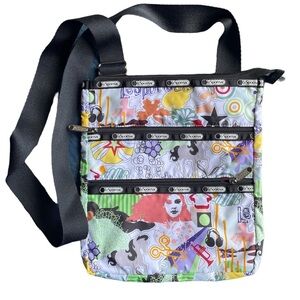 NWOT LeSportsac printed crossbody with 3 pockets  in‎ multicolored music print